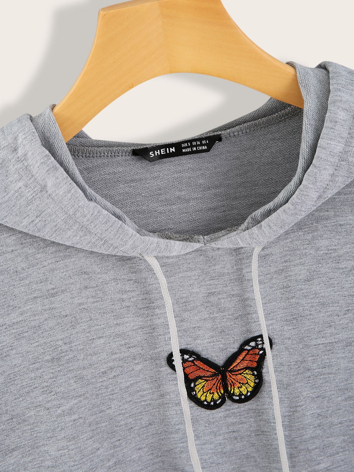 Butterfly Patched Kangaroo Pocket Drawstring Hoodie
